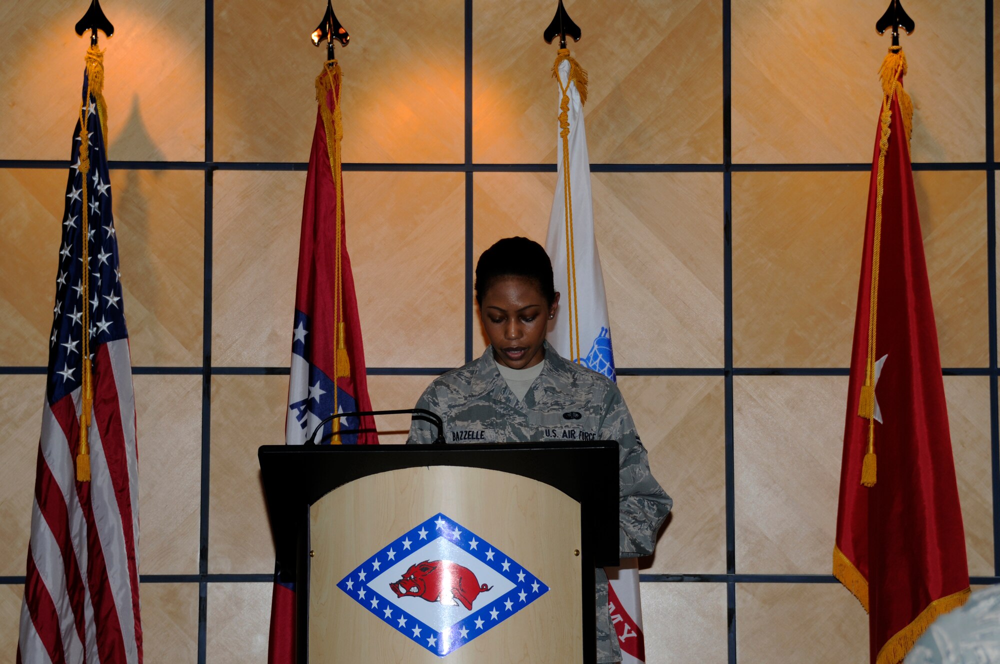 Airman 1st Class Tamesha Bazzelle speaks at the 188th Fighter Wing during a Women's History Month program March 2, 2013. The guest speaker was Brig. Gen. Patricia M. Anslow, who is the first female general officer in the Arkansas National Guard. (National Guard photo by 1st Lt. Holli Snyder/188th Fighter Wing Public Affairs)