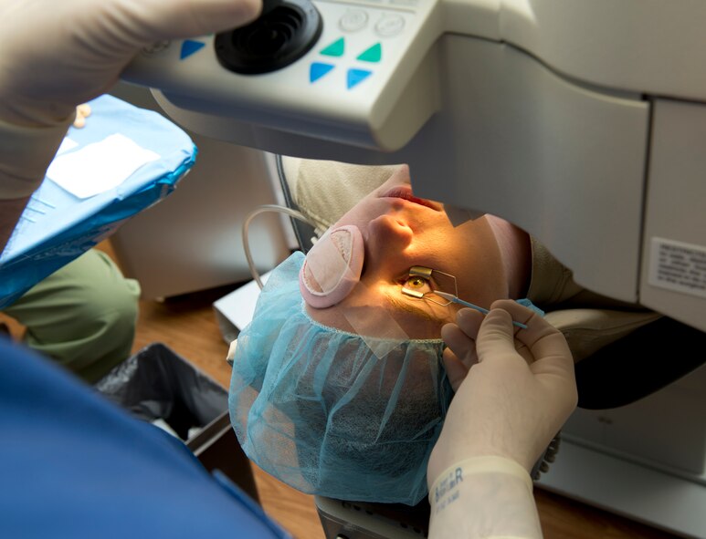 An Airman undergoes photorefractive keratectomy surgery to correct her vision March 4, 2013 at the Warfighter Refractive Surgery Center located in David Grant USAF Medical Center on Travis Air Force Base, Calif. PRK improves vision quality by changing the way images are focused on the retina.