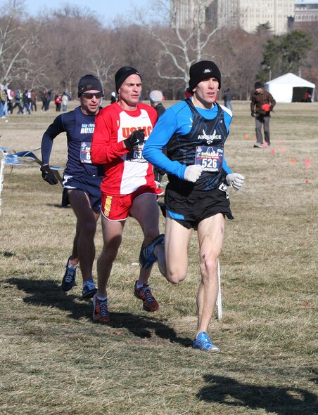 1st Lt. Jacob Bradosky, 341st Operations Group ICBM combat crew commander (right), races ahead of other competitors during the 2012 USA and Armed Forces Cross Country Championships in St. Louis. Bradosky finished the 12Kwith a time of 38 minutes and 47.9 seconds, placing 26th overall and seventh in the Armed Forces race, securing the Air Force with an overall 1st place win. (Courtesy photo) 