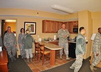 919th Special Operations Wing reservists check out a business suite following a grand-reopening ceremony for Duke Field’s completely renovated Duke Inn and Visiting Quarters March 1, 2013. The renovations corrected decades of substandard lodging for the facilities originally built in the 1950s. (U.S. Air Force photo/Dan Neely)