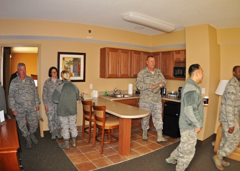 919th Special Operations Wing reservists check out a business suite following a grand-reopening ceremony for Duke Field’s completely renovated Duke Inn and Visiting Quarters March 1, 2013. The renovations corrected decades of substandard lodging for the facilities originally built in the 1950s. (U.S. Air Force photo/Dan Neely)