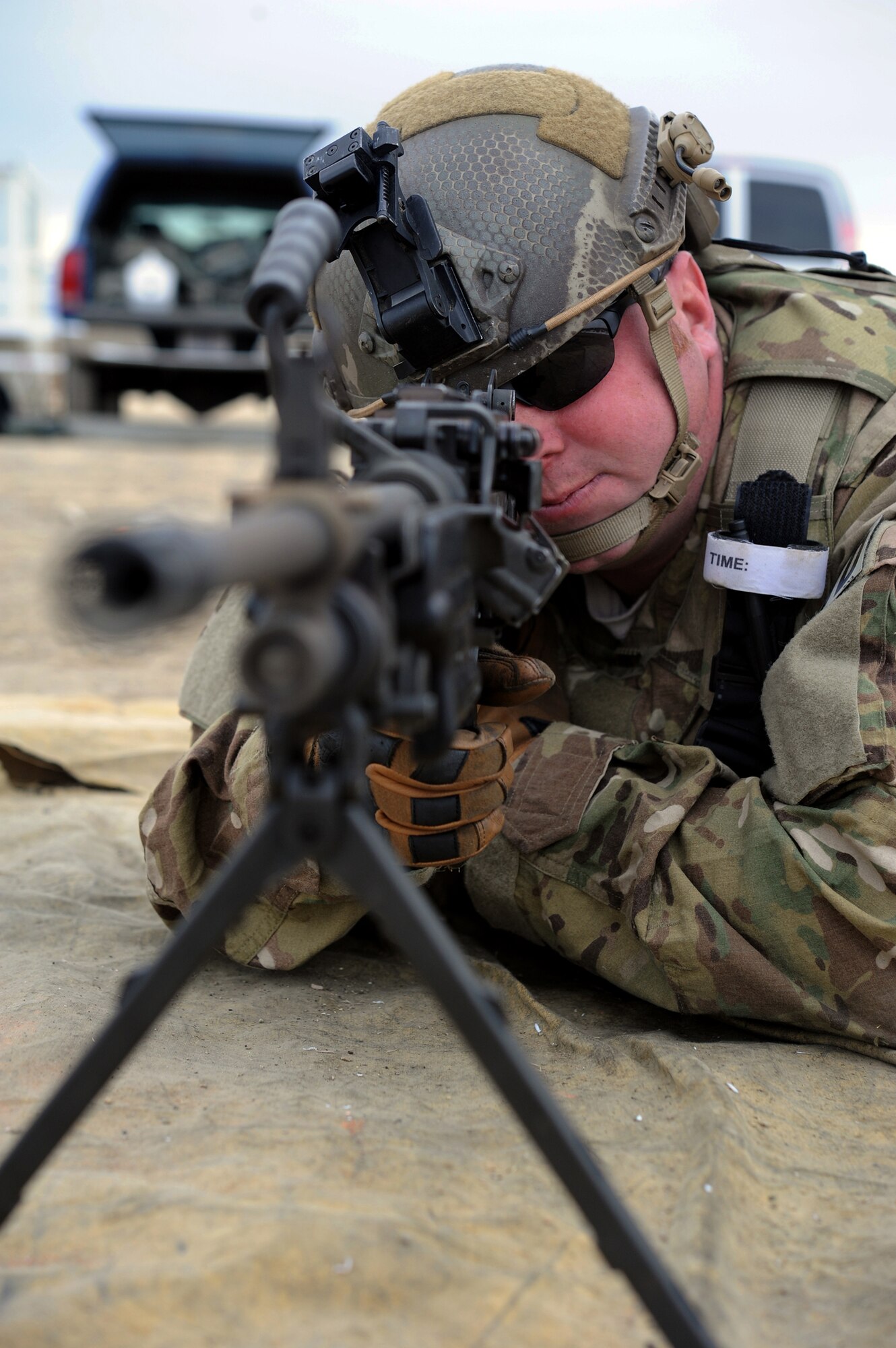 Staff Sgt. Nathan Faris, 341st Civil Engineer Squadron Explosive Ordnance Disposal technician, handles an M249 automatic rifle during a qualification course Feb. 27 at Fort Harrison in Helena, Mont. The course served Faris and 21 other Malmstrom Air Force Base Airmen with the necessary hands-on training to become proficient on the weapon. (U.S. Air Force photo/Staff Sgt. R.J. Biermann)