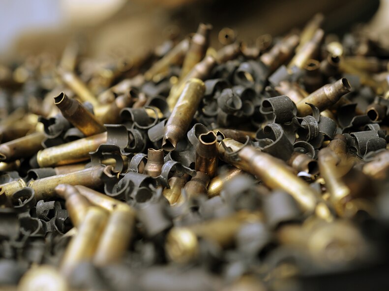 A detailed image of a pile of empty 5.56mm caliber bullet casings and ammunition links that were collected after the M249 automatic rifle qualification course Feb. 27 at Fort Harrison in Helena, Mont. The M249 ???reaches out further to provide more suppressive fire than the M4 carbine rifle,??? said Les Christenesen, 341st Security Support Squadron Combat Arms supervisor. (U.S. Air Force photo/Staff Sgt. R.J. Biermann)