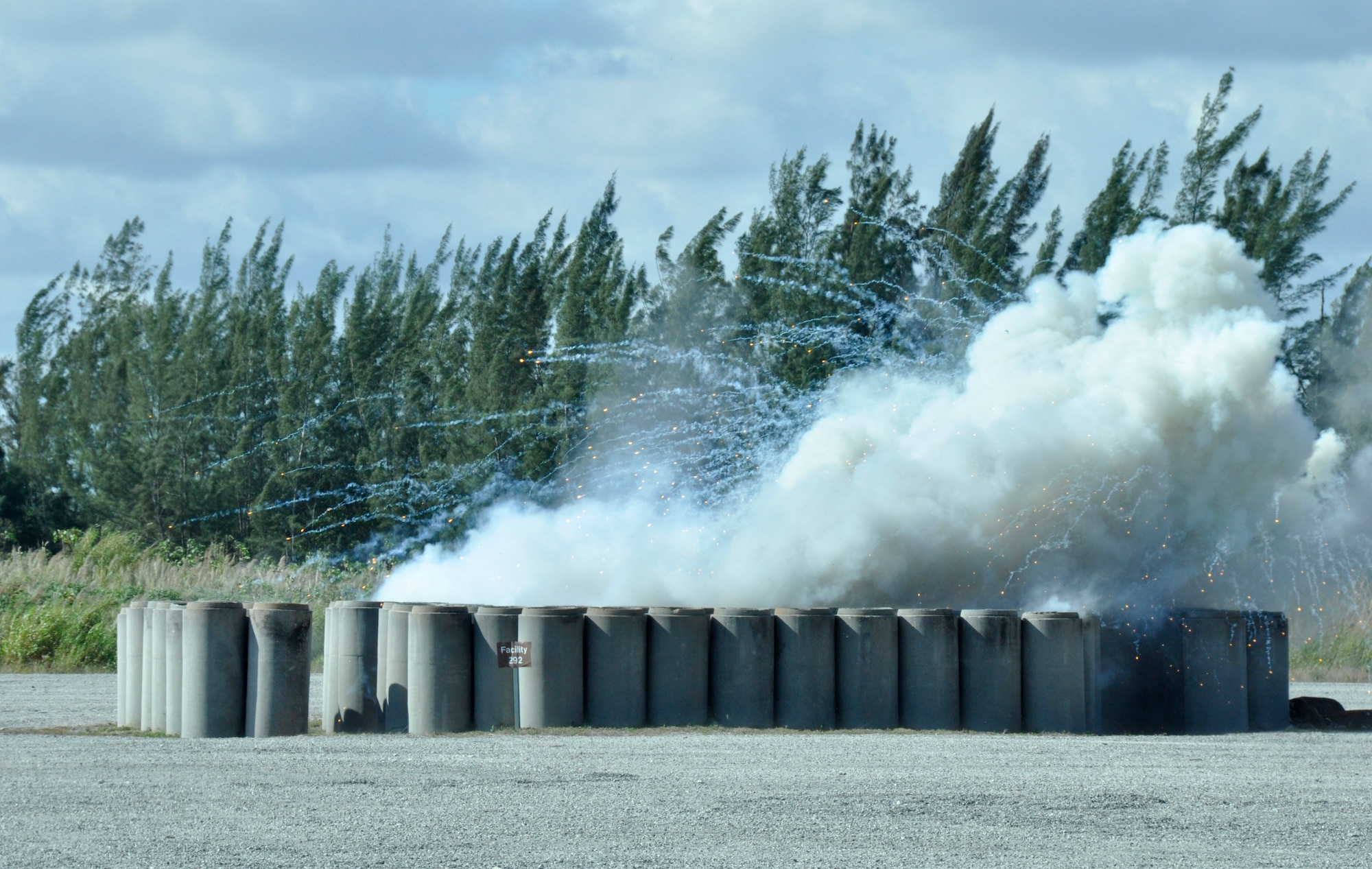Members of 482nd Civil Engineering Squadron Explosive Ordnance Disposal flight dispose of ordnance at Homestead Air Reserve Base, Fla., Feb. 10. EOD neutralizes used and unused ordnance that remain after an incident, accident, or enemy attack which presents a threat to military operations, installations, personnel or material. They tackle a range of contingencies from neutralizing explosives and bombs, to recovering found ordnance, and supporting the secret service, aircraft crashes, incident response teams, and post attack base recovery operations. (U.S. Air Force photo/Senior Airman Nicholas Caceres)