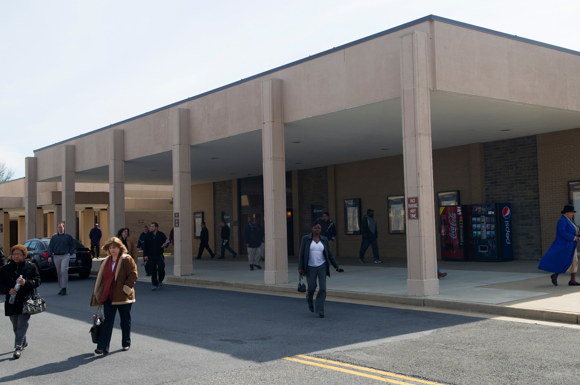 Air Force District of Washington civilian personnel leave a town hall meeting at the base theater March 6, 2013 at Joint Base Andrews, Md. The meeting was hosted by AFDW Commander Maj. Gen. Sharon K.G. Dunbar to discuss effects of the sequestration and furlough. (U.S. Air Force photo by 1st Lt. Ashleigh Peck)