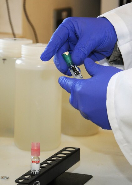 Airman 1st Class Ian Adams, 100th Civil Engineer Squadron Water and Fuels Systems apprentice from Farmers Branch, Texas, tests raw sewage for safe ammonia levels Feb. 28, 2013, at RAF Mildenhall, England. The Water and Fuels Systems Maintenance shop ensures only clean reclaimed water is released back into the environment after it has been treated at their plant. Water affects everyone on base, from having safe water to drink, to having water to clean and maintain equipment. (U.S. Air Force photo by Gina Randall/Released)