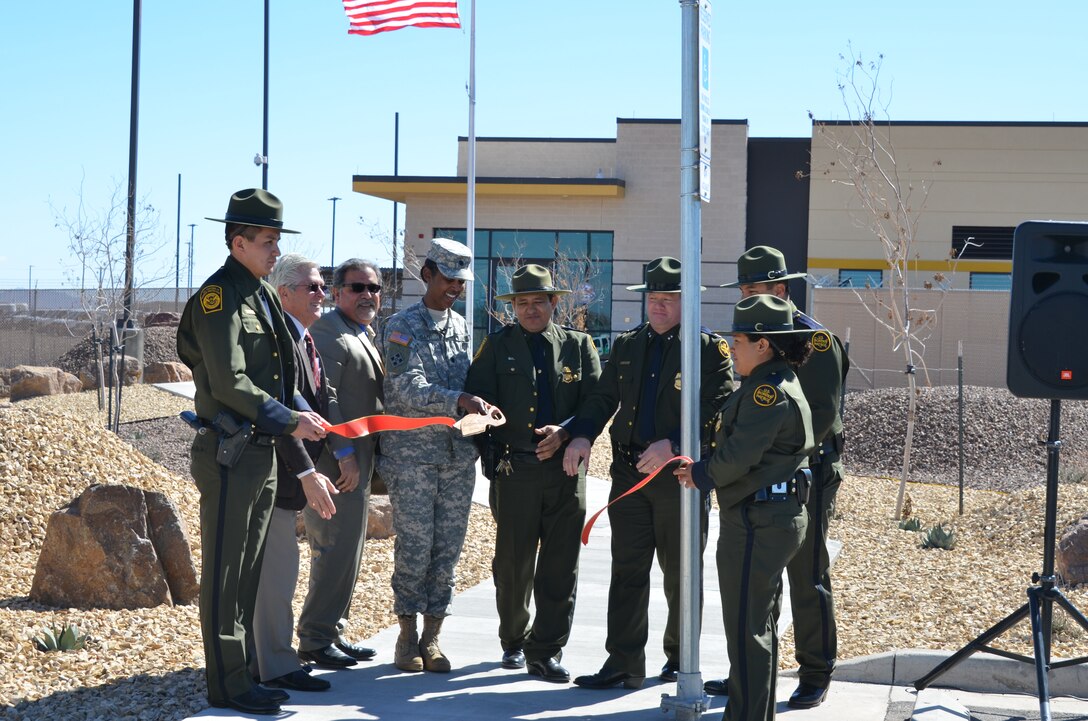 CLINT, TEXAS, -- Participants in the ribbon-cutting ceremony left to right: Border Patrol Agent Robert Crespo, Al Vasquez, Spawglass Contracting, Deputy Director Mr. Hector Montalvo, Lt. Col.  Gant, Assistant Patrol Agent in Charge Donald B. Lucero, Chief Patrol Agent Scott A. Luck, Border Patrol Agent Victor Loya, and Border Patrol Agent Tessa Reyes.