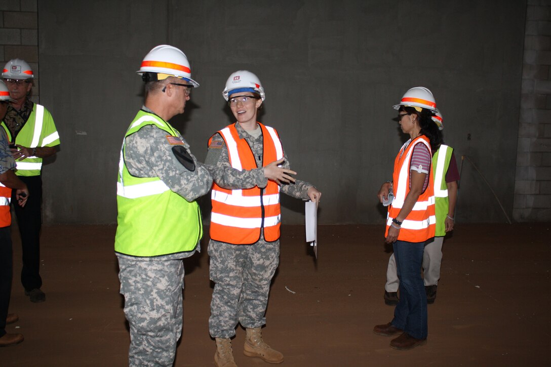 1st. Lt. Diana Worth (center, right) briefs Maj. Gen.Kendall Cox, U.S. Army Corps of Engineers deputy commanding general for Military and International Operations (center, left) on South Range facilities during an on-site visit in Oct. 2012.