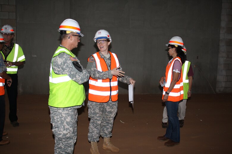 1st. Lt. Diana Worth (center, right) briefs Maj. Gen.Kendall Cox, U.S. Army Corps of Engineers deputy commanding general for Military and International Operations (center, left) on South Range facilities during an on-site visit in Oct. 2012.