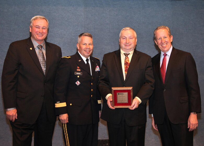 PHOTO: Ronald Goldman (2nd from right) was presented The Federal Engineers of the Year Award by MG Todd Semonite, Deputy Commander U.S. Army Corps of Engineers (2nd from Left). With Goldman is Dan J. Wittliff, (Left) President National Society of Professional Engineers and Mark J. Golden, National Society of Professional Engineers Executive Director. The presentation took place at the National Press Club, Washington, D.C.

