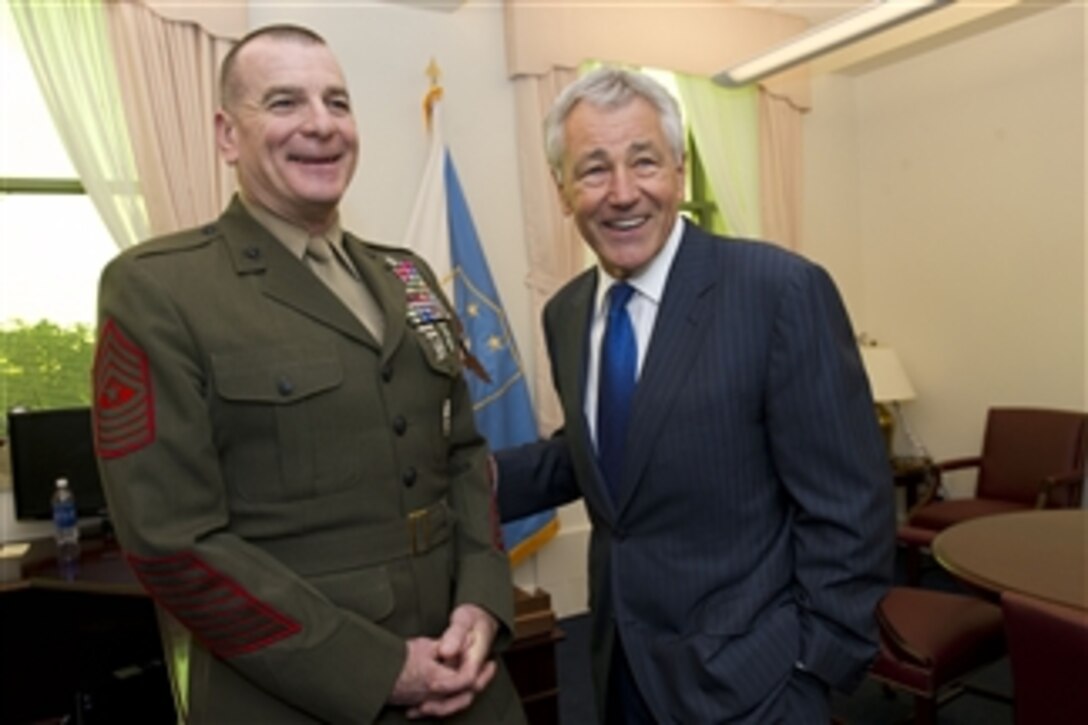 Secretary of Defense Chuck Hagel visits Senior Enlisted Advisor to the Chairman of the Joint Chiefs of Staff Sgt. Major Bryan Battaglia in his office in the Pentagon on March 5, 2013.  Hagel is informally meeting with each of the services senior enlisted advisors.  