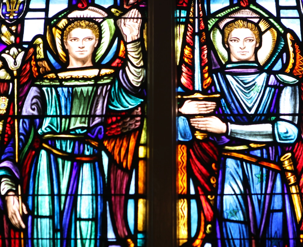 St. Joan of Arc, St. Gabriel and St. Michael along with a host of other saints adorn the windows of St. Francis Xavier Catholic Chapel aboard Marine Corps Base Camp Lejeune. The stained-glass windows were paid for with contributions of Marines world-wide and were given to the church in 1948. They are dedicated to Marines and sailors who served in various units throughout World War II. 