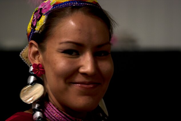 MARINE CORPS BASE HAWAII - Abriel Johnny-Rodriguez, a Native American “jingle dress” dancer, before performing a dance during Cultural Heritage Day at Kahuna’s Ballroom on Marine Corps Base Hawaii, March 1. The event, which will be held annually, highlights America’s diversity and common heritage on MCB Hawaii. (U.S. Marine Corps photo by Lance Cpl. Suzanna Lapi) 