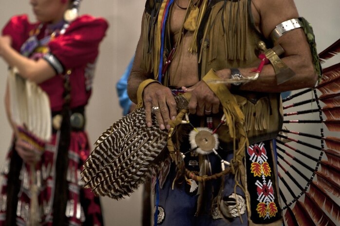 MARINE CORPS BASE HAWAII - Dr. David Bevett, a substance abuse counselor with Schofield Barracks and traditional Native American dancer from Cherokee and Shawnee bloodlines, dances during Cultural Heritage Day at Kahuna’s Ballroom on Marine Corps Base Hawaii, March 1. The event, which will be held annually, highlights America’s diversity and common heritage on MCB Hawaii. (U.S. Marine Corps photo by Lance Cpl. Suzanna Lapi) 