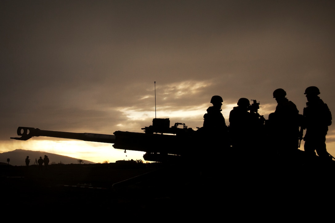 POHAKULOA TRAINING AREA, Hawaii — Field artillerymen with Charlie Battery, 1st Battalion, 12th Marine Regiment, load a round into the M777 155 mm howitzer system after ensuring the round had the correct charge, during Operation Spartan Fury at Pohakuloa Training Area, Hawaii, Feb. 21. (U.S. Marine Corps photo by Lance Cpl. Nathan Knapke) 
