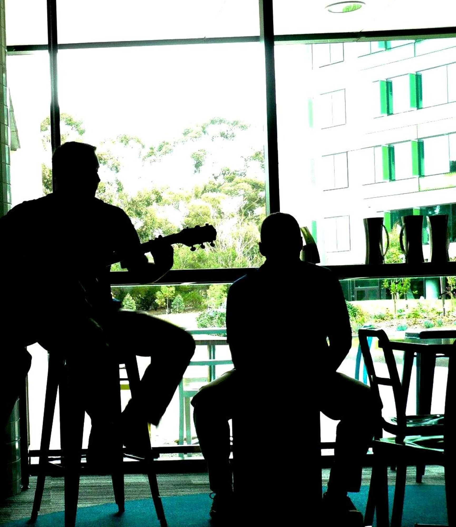 Senior Airman  Kusterer and SSgt Griffin play an acoustic set at a children's hospital.

Photos courtesy of Consulate General of the United States Melbourne, Australia