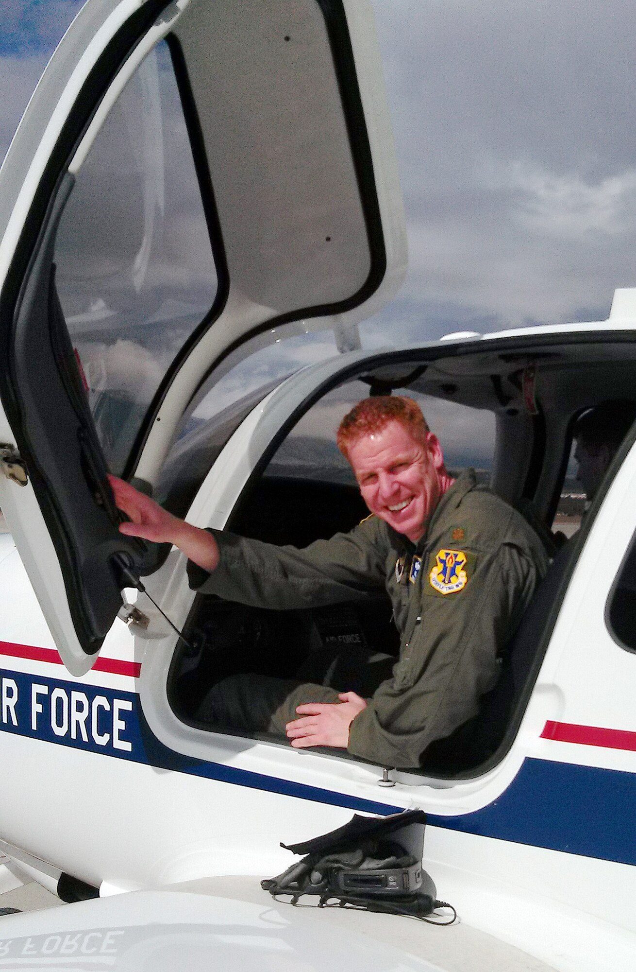 Maj. Jerry Siegel exits a T-53 Kadet II after reaching 300 flying hours in the aircraft March 4, 2013. Siegel is a powered flight instructor with the 557th Flying Training Squadron. (U.S. Air Force photo)