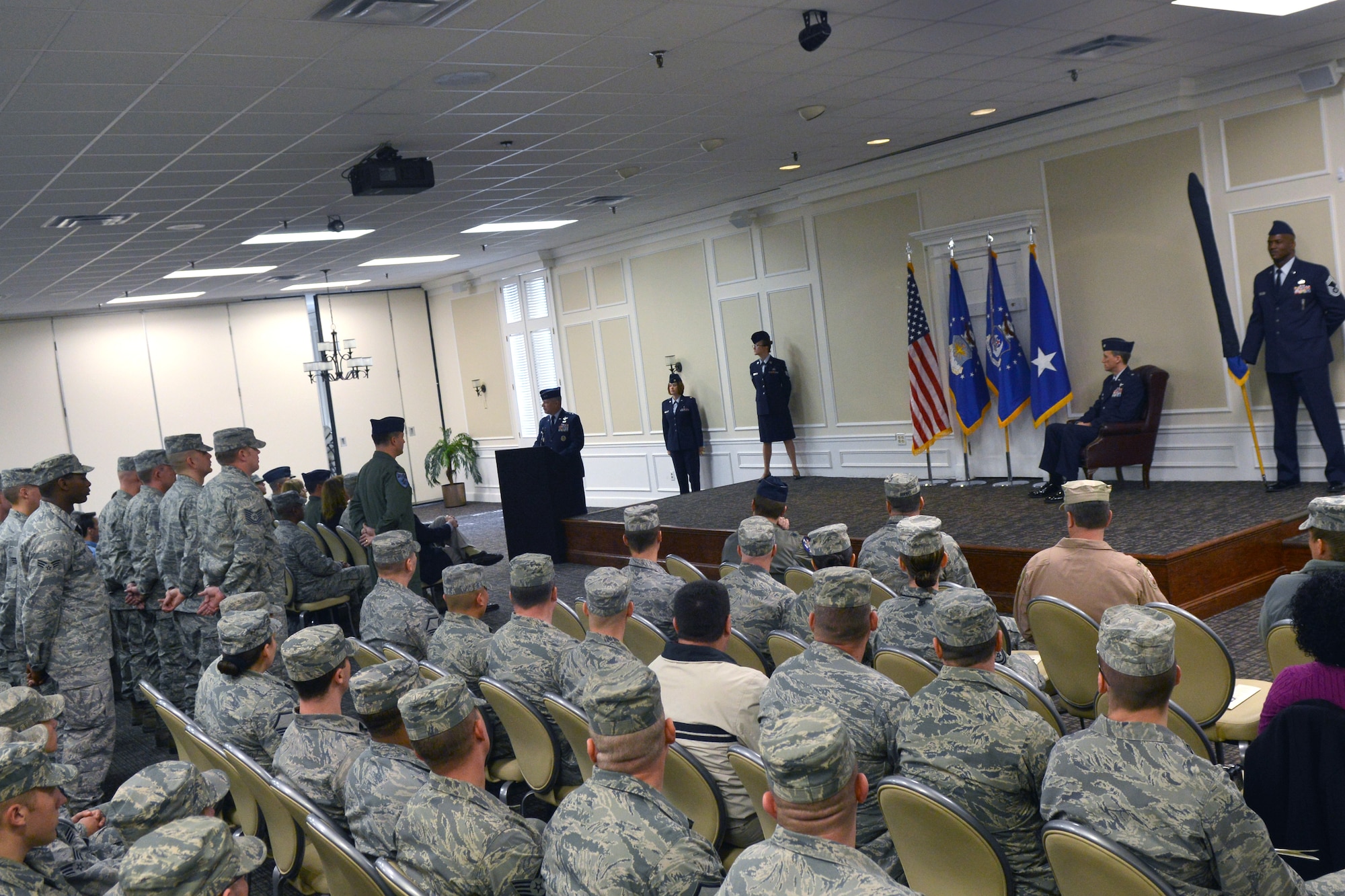 Team Shaw members listen to Maj. Gen. Lawrence Wells, 9th Air Force commander, as he says a few words about the activation of the 495th Fighter Group, Shaw Air Force Base, S.C., March 8, 2013. The group’s history is taken from the 495th FTG, which was originally established on Oct. 9, 1943 and deactivated April 15, 1945 and trained P-47 Thunderbolt pilots during World War II. (U.S. Air Force photo by Airman 1st Class Ashley L. Gardner/Released)