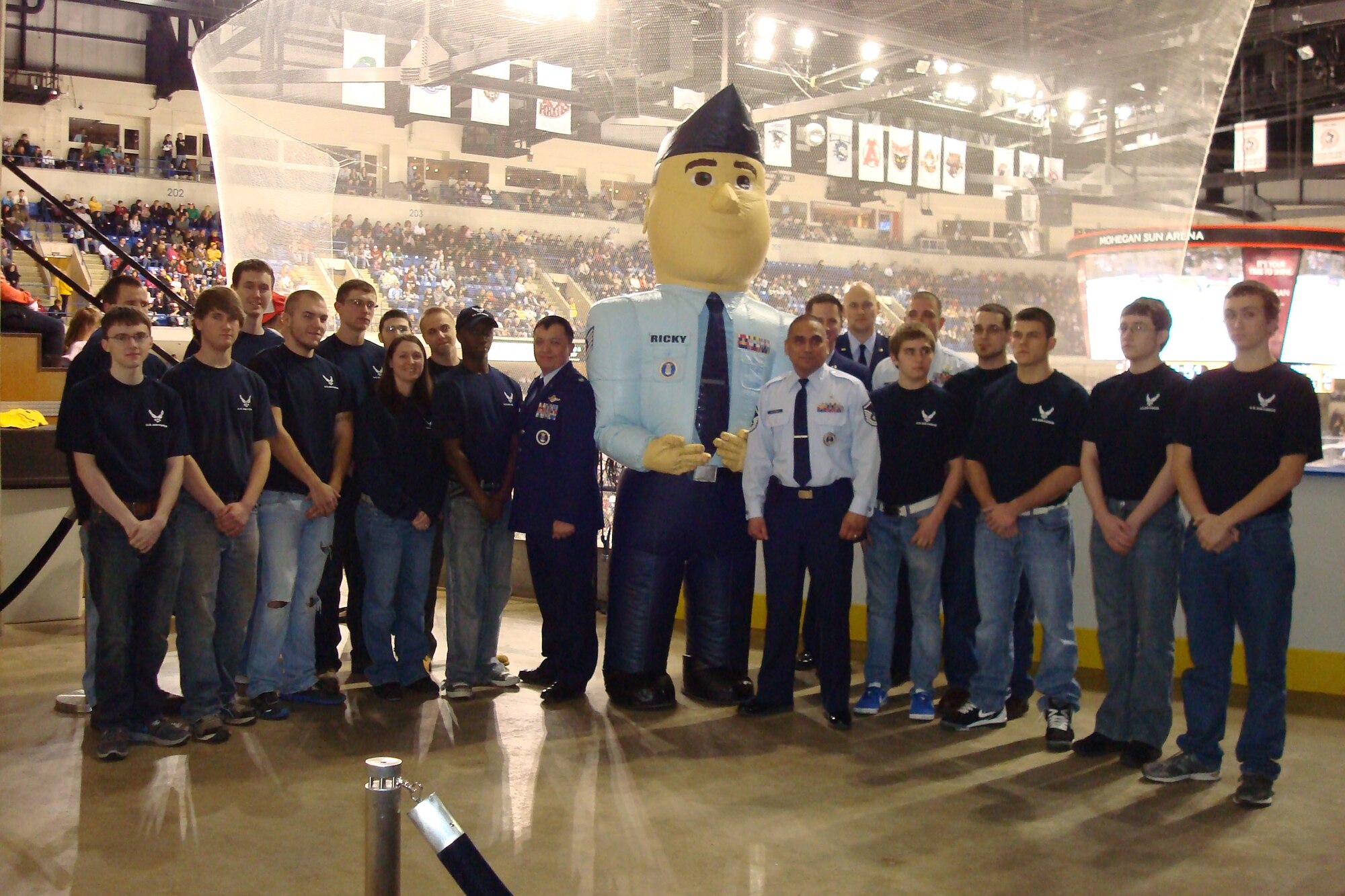 Members of the 314th Recruiting Squadron and their DEP pose with Ricky the Recruiter at the Wilkes-Barre/Scranton Penguins Military Appreciation Day Feb. 23.
