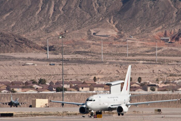 Royal Australian Air Force E-7A Airborne Early Warning and Control aircraft holds short of the active runway at Nellis Air Force Base, Nev., Feb. 27, 2013. RAAF E-7A pilots, maintainers and support members are participating in Red Flag for the first time. (U.S. Air Force photo by Lawrence Crespo)