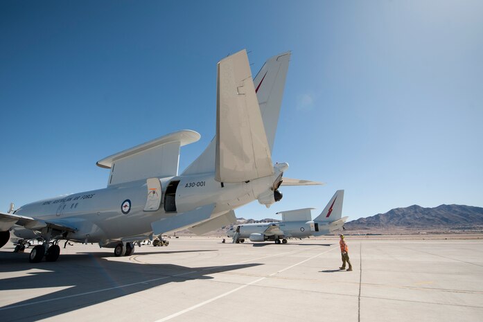 Royal Australian Air Force No. 2 Squadron Leading Aircraftman Doug Ansel, aircraft technician, inspects the tail of an E-7A Wedgetail aircraft prior to a Red Flag training mission Feb. 27, 2013. The E-7A is an airborne early warning and control aircraft responsible for conducting surveillance, air defense, fleet support and force coordination operations in defense of Australian sovereignty and national interests. (U.S. Air Force photo by Lawrence Crespo)