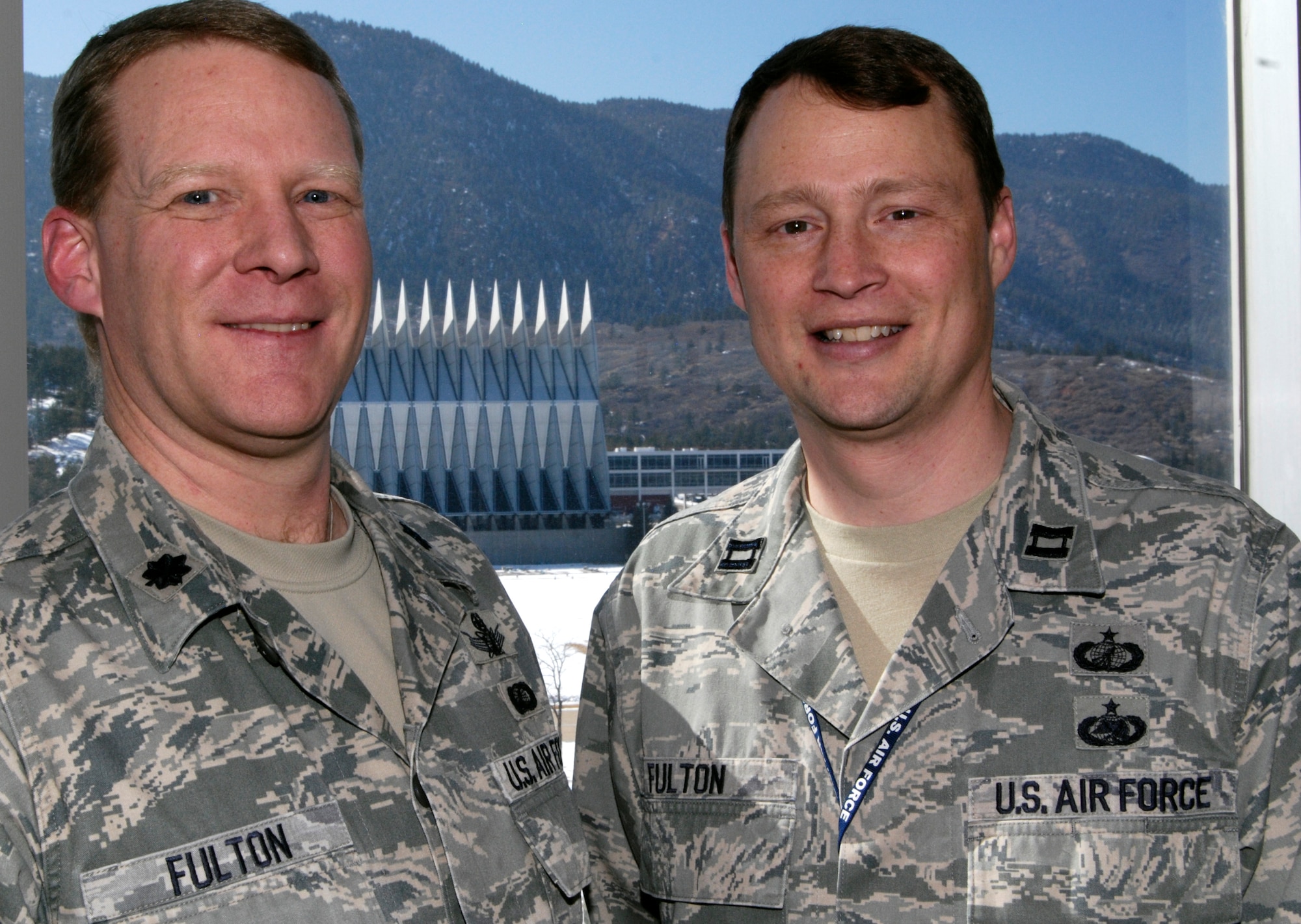 Lt. Col. Joe Fulton and his brother, Capt. Tom Fulton, took two distinct paths but ended up at the Air Force Academy, where they will end their careers during a joint retirement ceremony in May. Joe is the Astronautics Department deputy head; Tom is a calculus instructor with the Mathematical Sciences Department. (U.S. Air Force photo/Don Branum)