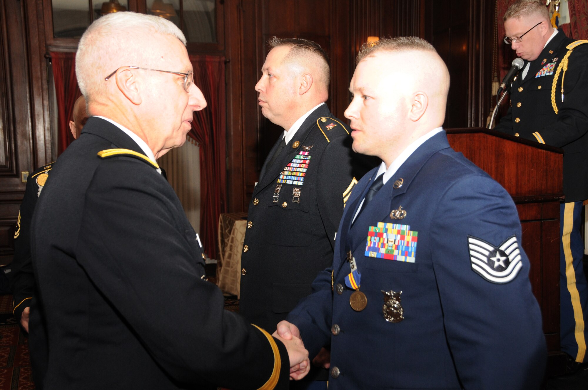 Army Maj. Gen. Wesley E. Craig, adjutant general of Pa. (left) with 2013 Octavius
V. Catto Medal recipients Army Sgt. 1st Class Bruce E. Facer, Sr. (center) and
Tech. Sgt. Kevin Watson (right) at an official award ceremony held Feb. 23 at the
Union League in Philadelphia.