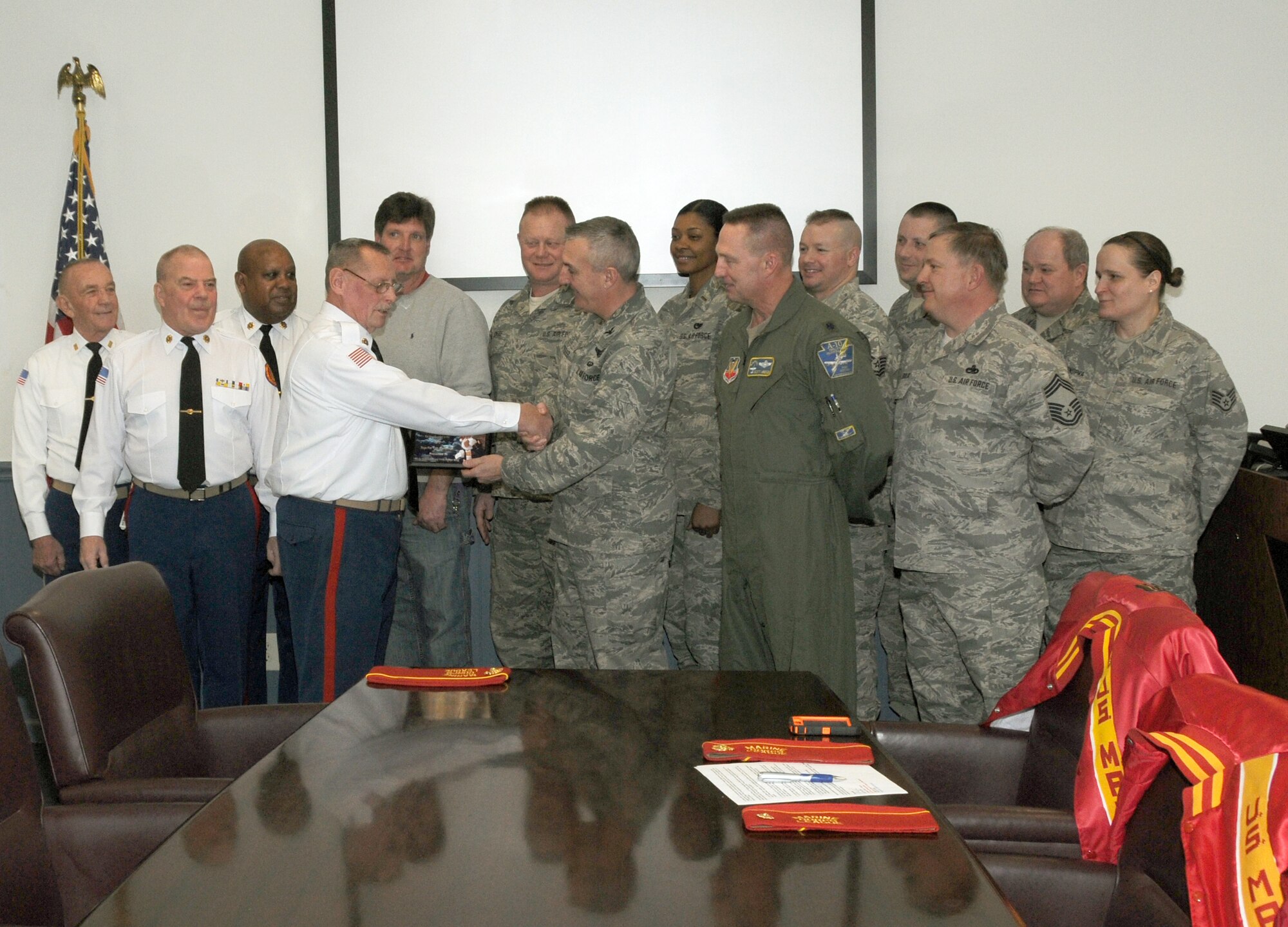 Marine Corps League Gunnery Sgt. John W. Zaengle Detachment Senior-Vice Commandant Al DePue presents a “Toys for Tots” plaque to Col. Howard “Chip”
Eissler, 111th Fighter Wing commander, Horsham Air Guard Station, Pa. Air National Guard, on Feb. 14 in appreciation for the hard work and support Wing members provided to their organization during last year’s “Toys for Tots” campaign.