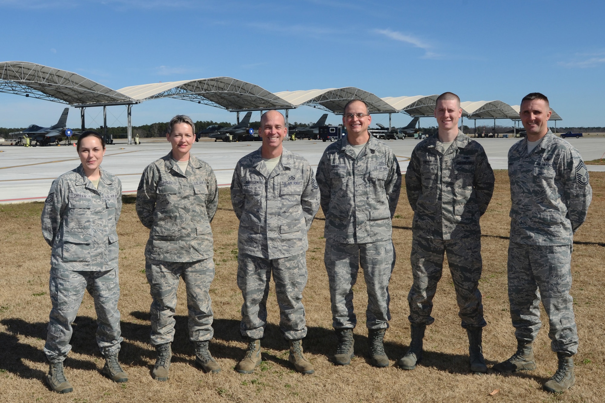 Airfield managers with the 169th Operations Support Flight at McEntire Joint National Guard Base, S.C., pose for a photo at the flight line, Feb. 20, 2013. The group was awarded the Airfield Operations Flight Complex of the Year.
(National Guard photo by Tech. Sgt. Caycee Watson/Released)