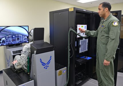 Air Force Staff Sgt. Jason Boyd and Tech. Sgt. Andre Scott, 359th Aeromedical Squadron Aerospace and Operational Physiology Flight craftsmen, conduct tests on the new hypoxia familiarization trainer Feb. 21 at Joint Base San Antonio-Randolph. (U.S. Air Force photo by Benjamin Faske/ Released)