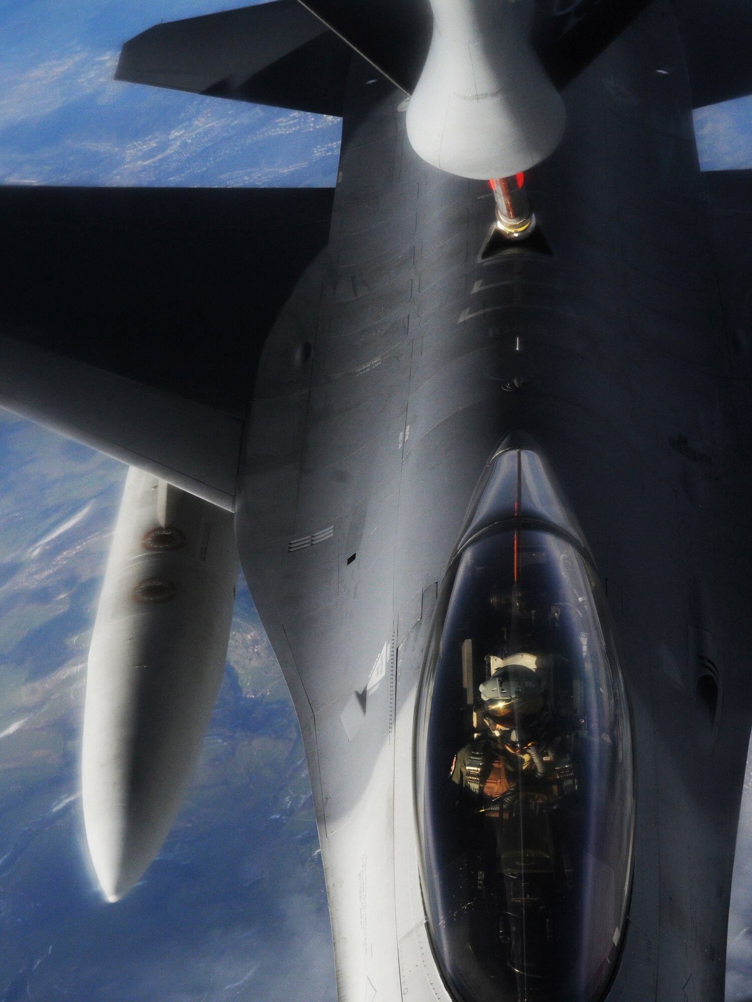 An F-16 Fighting Falcon from the 52nd Fighter Wing, Spangdahlem Air Base, Germany, takes on fuel during a refueling mission with a KC-135 Stratotanker from the 100th Air Refueling Wing, RAF Mildenhall, England, after completing a refueling mission Mar. 7, 2013, over Germany. The 100th ARW trains with many types of aircraft to more effectively accomplish their refueling mission during times of war.  (U.S. Air Force photo by 1st Lt. Christopher Mesnard/Released)