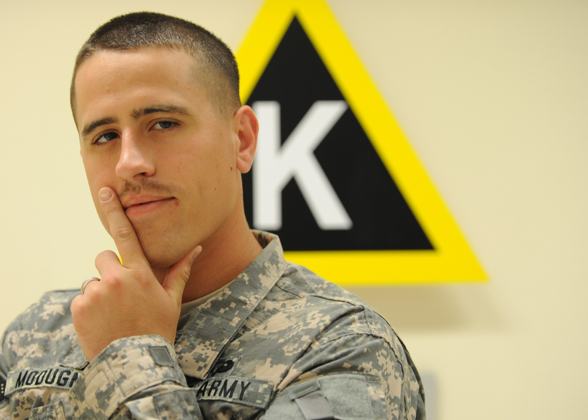 SOUTHWEST ASIA – Army Capt. Steven Modugno, 69th Air Defense Artillery Regiment Public Affairs, said he grew his March mustache because he was originally in an aviation unit and continues to support the tradition. (U.S. Air Force photo/Senior Airman Joel Mease)