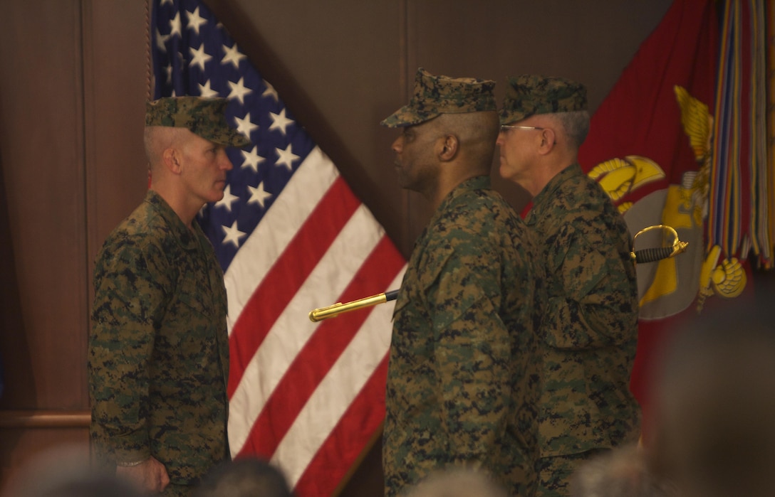 Sgt. Maj. Bradley Kasal takes over as division sergeant major for 4th Marine Division, Saturday, March 9, 2013, at a ceremony at the Marine Corps Support Facility here. Kasal replaces Sgt. Maj. Robert Hightower as the senior enlisted member of the largest Divsion in the Marine Corps. Hightower retired at the same ceremony after serving more than 30 years in the Corps. (U.S. Marine Corps photo by Cpl. Michael Ito/Released)
