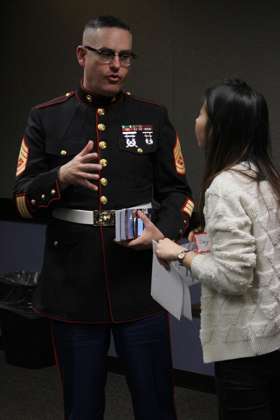 Gunnery Sgt. James R. Wallace, musician placement director for the First Marine Corps District, speaks during Berklee the School of Music's "Job Jam." Wallace, who attended Berklee from 1992 - 1995 before joining the Marine Corps Band was invited back as a part of the job jam to discuss his personal experiences and the career opportunities the USMC band presents to current day Berklee students.