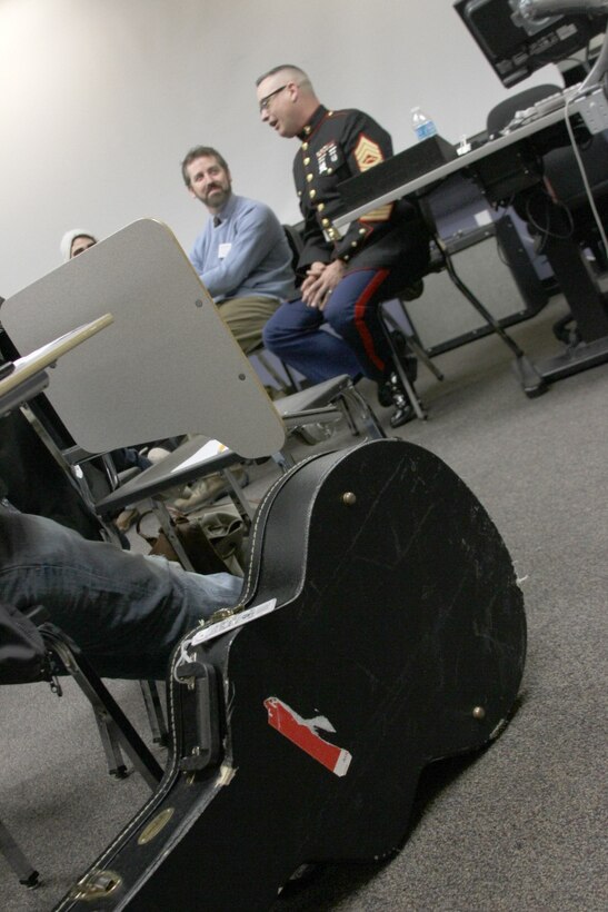 Gunnery Sgt. James R. Wallace, musician placement director for the First Marine Corps District, speaks during Berklee the School of Music's "Job Jam." Wallace, who attended Berklee from 1992 - 1995 before joining the Marine Corps Band was invited back as a part of the job jam to discuss his personal experiences and the career opportunities the USMC band presents to current day Berklee students.