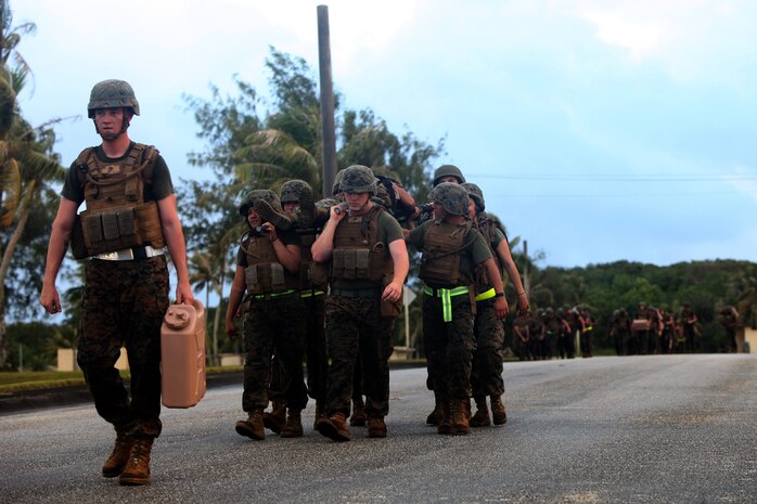 Marines carry a simulated casualty on a stretcher during unit PT March 8 on Naval Computer and Telecommunications Area Master Station during Exercise Guahan Shield. Guahan Shield is designed to facilitate multiservice engagements, set conditions for bilateral and multilateral training opportunities, and support rapid response to potential to theater crises and contingency operations in the Asia-Pacific region. The Marines are part of Combat Logistics Detachment 39, 9th Engineer Support Battalion, 3rd Marine Logistics Group, III Marine Expeditionary Force. 