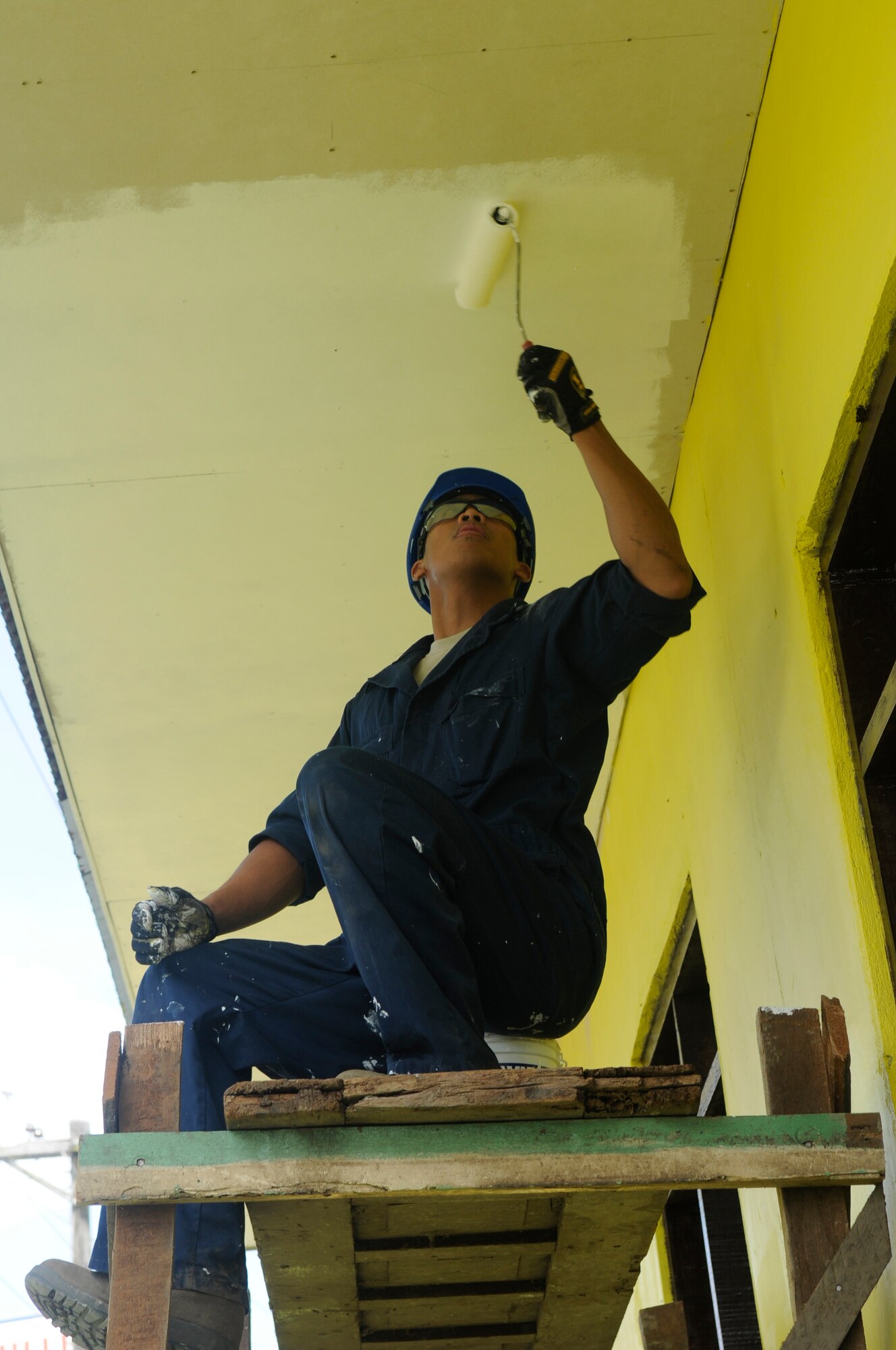 U.S. Air Force Airman 1st Class Peter Francisco begins a building renovation as part of a team of American and Filipino Operation Pacific Angel-Philippines engineers at an elementary school in Pamplona, Philippines, March 4, 2013. The renovations included electrical, drywall, windows and painting. Francisco is an engineer form the Guam Air National Guard at Andersen Air Force Base, Guam. Operation Pacific Angel is a joint and combined humanitarian assistance mission held in various countries several times a year and includes medical, dental, optometry, engineering programs and various subject-matter expert exchanges. (U.S. Air Force photo/Senior Master Sgt. J.C. Woodring)

