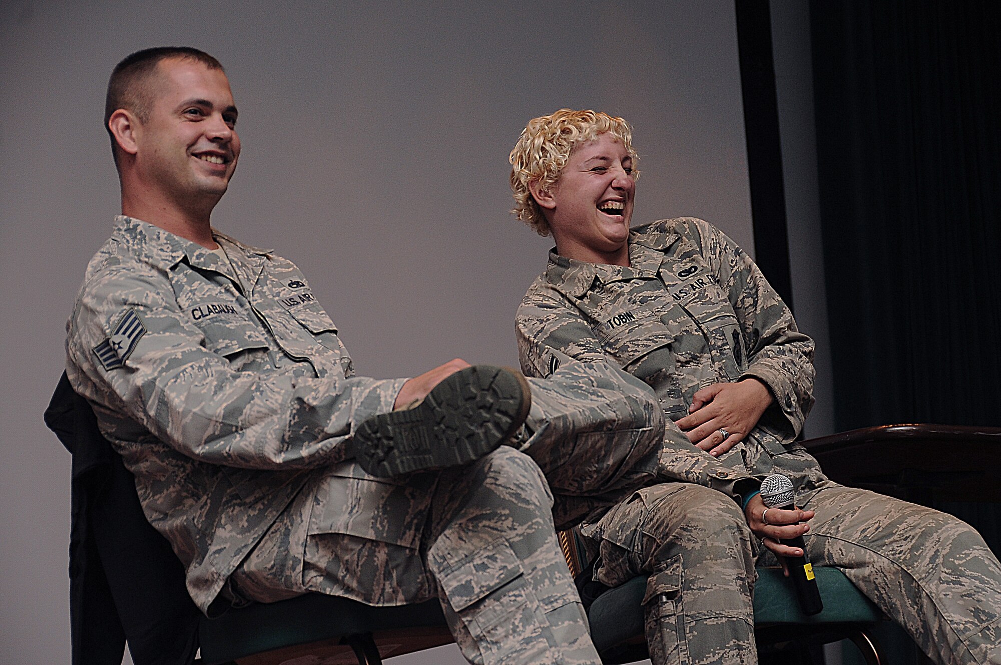 Staff Sgt. William Clabaugh, 36th Maintenance Squadron armament team member, and Airman 1st Class Elizabeth Tobin, 36th Security Forces Squadron fire team member, role play as a couple during safe dating presentation on Andersen Air Force Base, Guam, March 8, 2013. This is the second consecutive year Mike Domitrz, founder of The Date Safe Project, Inc., spoke to members of Team Andersen in his 20-year history of presentations on safe dating. To send a consistent message, Airmen of all ages, ranks and leadership positions attended this event. (U.S. Air Force photo by Airman 1st Class Adarius Petty/Released)