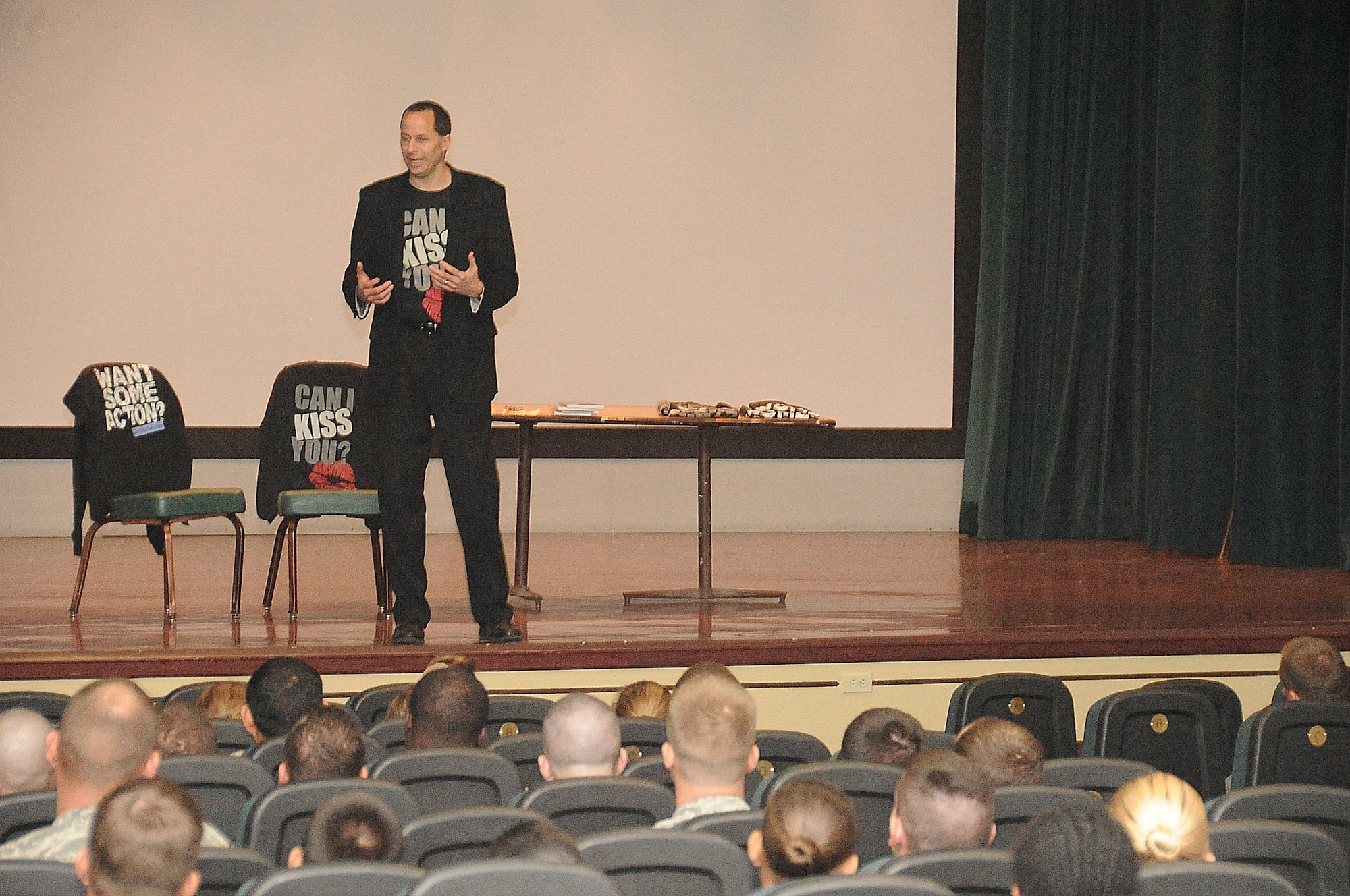 Mike Domitrz, founder of The Date Safe Project, Inc., speaks to Airmen during a presentation on Andersen Air Force Base, Guam, March 6, 2013. This is the second consecutive year Domitrz’s spoke to members of Team Andersen in his 20-year history of presentations on safe dating.  To send a consistent message, Airmen of all ages, ranks and leadership positions attended this event. (U.S. Air Force photo by Airman 1st Class Adarius Petty/Released)