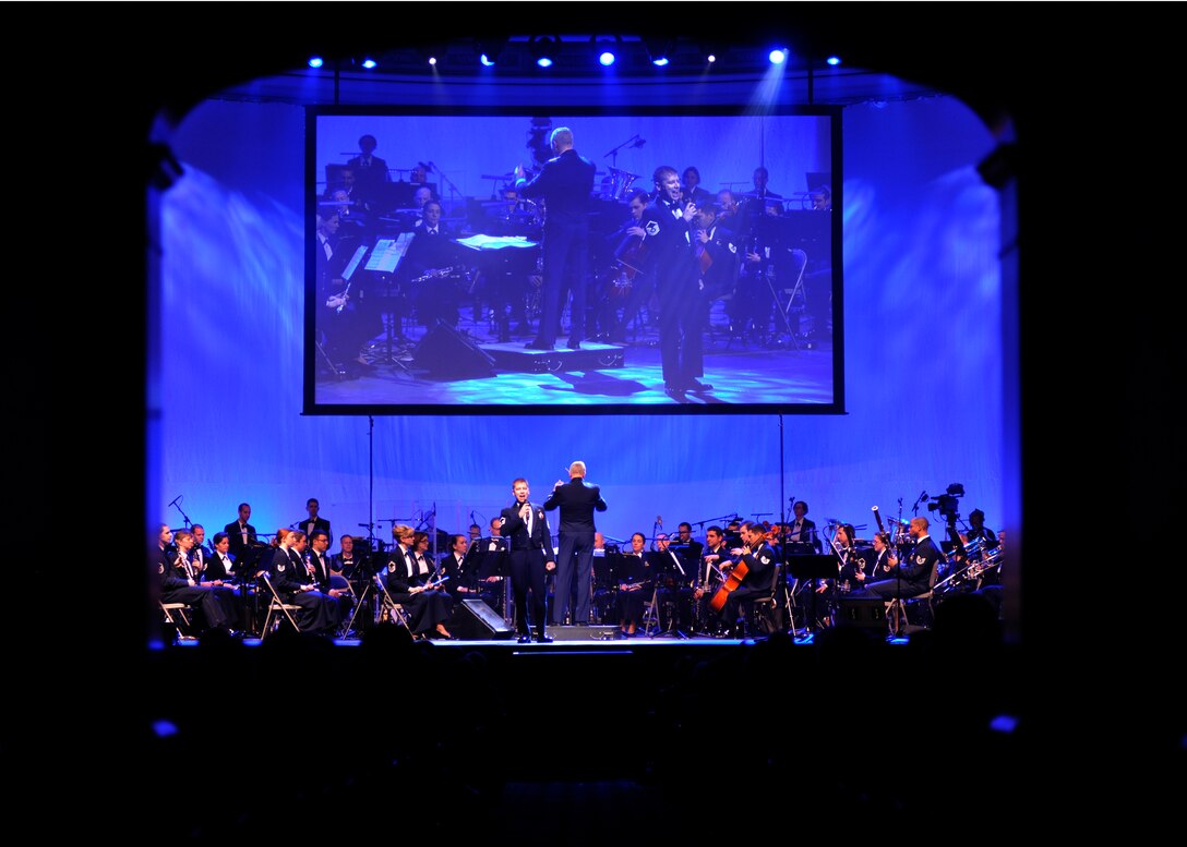 Master Sgt. Ryan Dolan, member of the U.S. Air Force’s Singing Sergeants, performs during the final installment of the Air Force Band’s 2013 Guest Artist Series March 10, 2013, at DAR Constitution Hall in Washington, D.C. The Guest Artist Series began in 1966 and has evolved to feature entertainers of national and international renown who perform alongside the Air Force Band. (U.S. Air Force photo/Senior Airman Lindsey A. Porter)