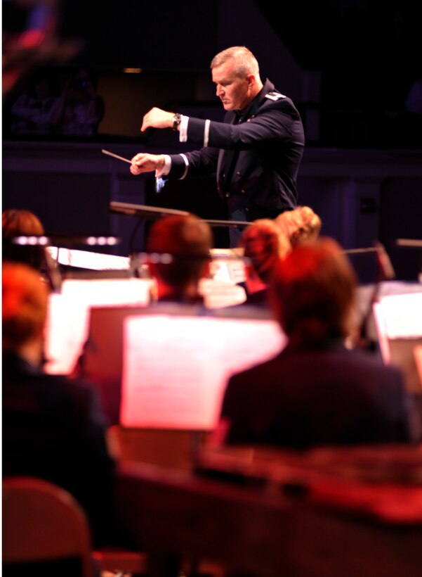 Col. Larry Lang, U.S. Air Force Band commander, conducts the Air Force Band March 10, 2013, during a performance at DAR Constitution Hall in Washington, D.C. The performance was part of the Air Force Band’s 2013 Guest Artist Series which highlighted entertainers such as Melina Leon, The Rogues and Lee Greenwood. (U.S. Air Force photo/Senior Airman Lindsey A. Porter)