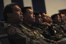 Exercise participants from the U.S. Air Force, Royal Thai Air Force and Republic of Singapore Air Force attend a multilateral in-brief during Cope Tiger 13 Field Training Exercise at Korat Royal Thai Air Force Base, Thailand, March 10, 2013. The exercise reinforces U.S. Pacific Command's strategic objectives for the Southeast Asian region and demonstrates U.S. capability to project forces strategically in a combined and joint environment through robust combined air operations. More than 300 U.S. service members are participating in CT13, which offers an unparalleled opportunity to conduct a wide spectrum of large force employment air operations and strengthen military-to-military ties with two key partner nations, Thailand and Singapore. (U.S. Air Force photo/2nd Lt. Jake Bailey) (Released)