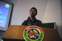 A Royal Thai Air Force representative briefs exercise participants from the U.S. Air Force, Royal Thai Air Force and Republic of Singapore Air Force during a multilateral in-brief for the Cope Tiger 13 Field Training Exercise at Korat Royal Thai Air Force Base, Thailand, March 10, 2013.  More than 300 U.S. service members are participating in CT13, which offers an unparalleled opportunity to conduct a wide spectrum of large force employment air operations and strengthen military-to-military ties with two key partner nations, Thailand and Singapore. (U.S. Air Force photo/2nd Lt. Jake Bailey) (Released)