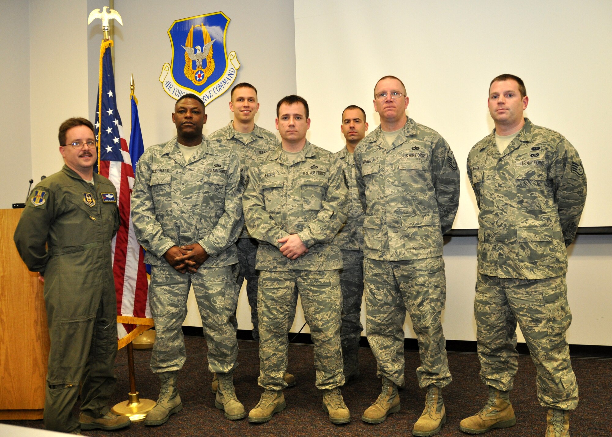NIAGARA FALLS AIR RESERVE STATION, N.Y. - Twelve members of the 914th Airlift Wing were part of the October 2012 Community College of the Air Force graduating class and received special recognition from wing leadership for their achievement during the unit training assembly here March 3.  Pictured left to right:  Senior Master Sgt. Eric Wolfe, Master Sgt. Mark McDonald, Tech. Sgt. Grayson Weil, Master Sgt. Timothy Ferris, Master Sgt. Jesse Bonacci, Master Sgt. Robin Gradle, Staff Sgt. Andrew Slahta.  Missing from photo are Master Sgt. Jennifer Petruzzi, Tech. Sgt. Kyle Spaulding, Staff Sgt. Ryan Marr, Staff Sgt. Marie York, Staff Sgt. Thomas Mahendra.  (U.S. Air Force photo by Master Sgt. Kevin Nichols)