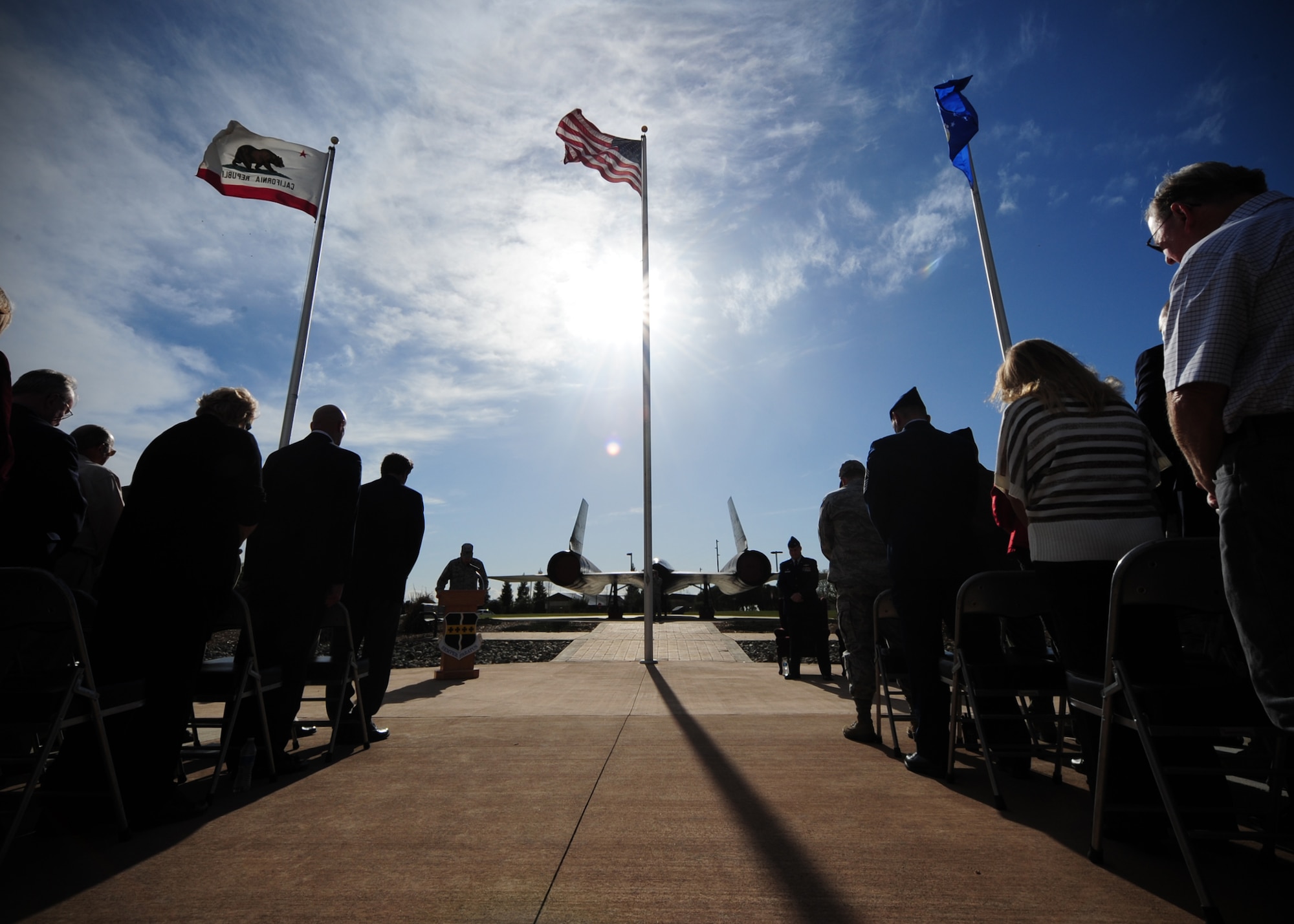 Chaplain (Lt. Col.) Keith Dobbe, 548th Intelligence, Surveillance and Reconnaissance Group, gives the invocation at a ceremony dedicating a plaque to the 1st Reconnaissance Squadron’s 100 year anniversary celebration March 8, 2013, at Beale Air Force Base, Calif. The plaque at Heritage Park rests in the shadow of an SR-71 Blackbird. (U.S. Air Force photo by Senior Airman Shawn Nickel/Released)