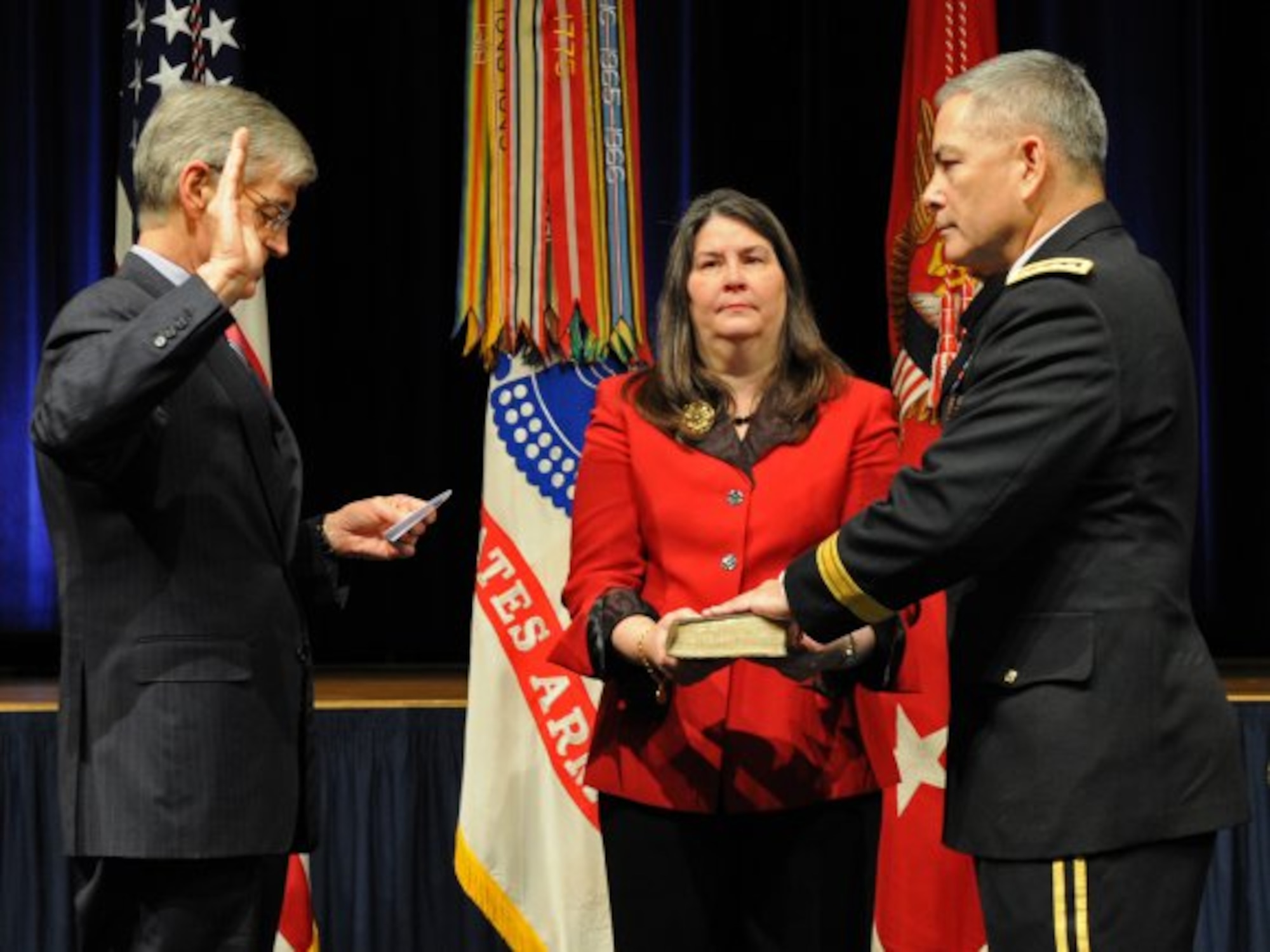 After receiving his fourth star, Gen. John F. Campbell is sworn in as the Army's 34th vice chief of staff by Secretary of the Army John McHugh, March 8, 2013. Campbell's wife, Ann, holds the Bible. Campbell succeeds Gen. Lloyd J. Austin III as the Army's vice chief of staff. (U.S. Army photo by J. D. Leipold)