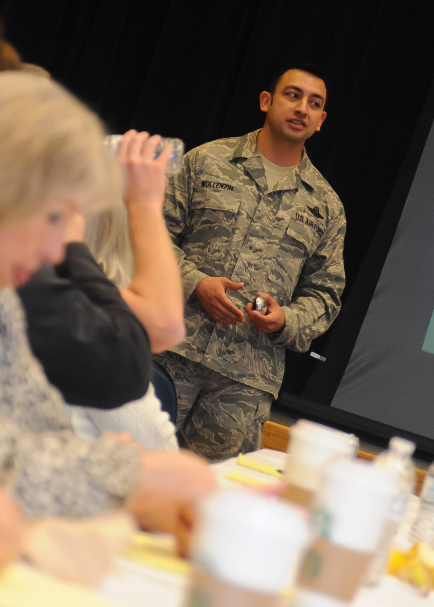 ALTUS AIR FORCE BASE, Okla. – Master Sgt. Andrew Wollenzin, 97th Air Mobility Wing Airman Leadership School commandant, speaks to 97th AMW honorary commanders at the Freedom Community Center during Altus AFB’s first Honorary Commander Boot Camp, March 8. The boot camp was held to allow Honorary Commanders a chance to experience a day in the life of an Airman, and to learn about the history and traditions of the U.S. Air Force. The Honorary Commander program fosters and strengthens the friendship and partnership between the base and surrounding community.  (U.S. Air Force photo by Airman 1st Class Levin Boland / Released)