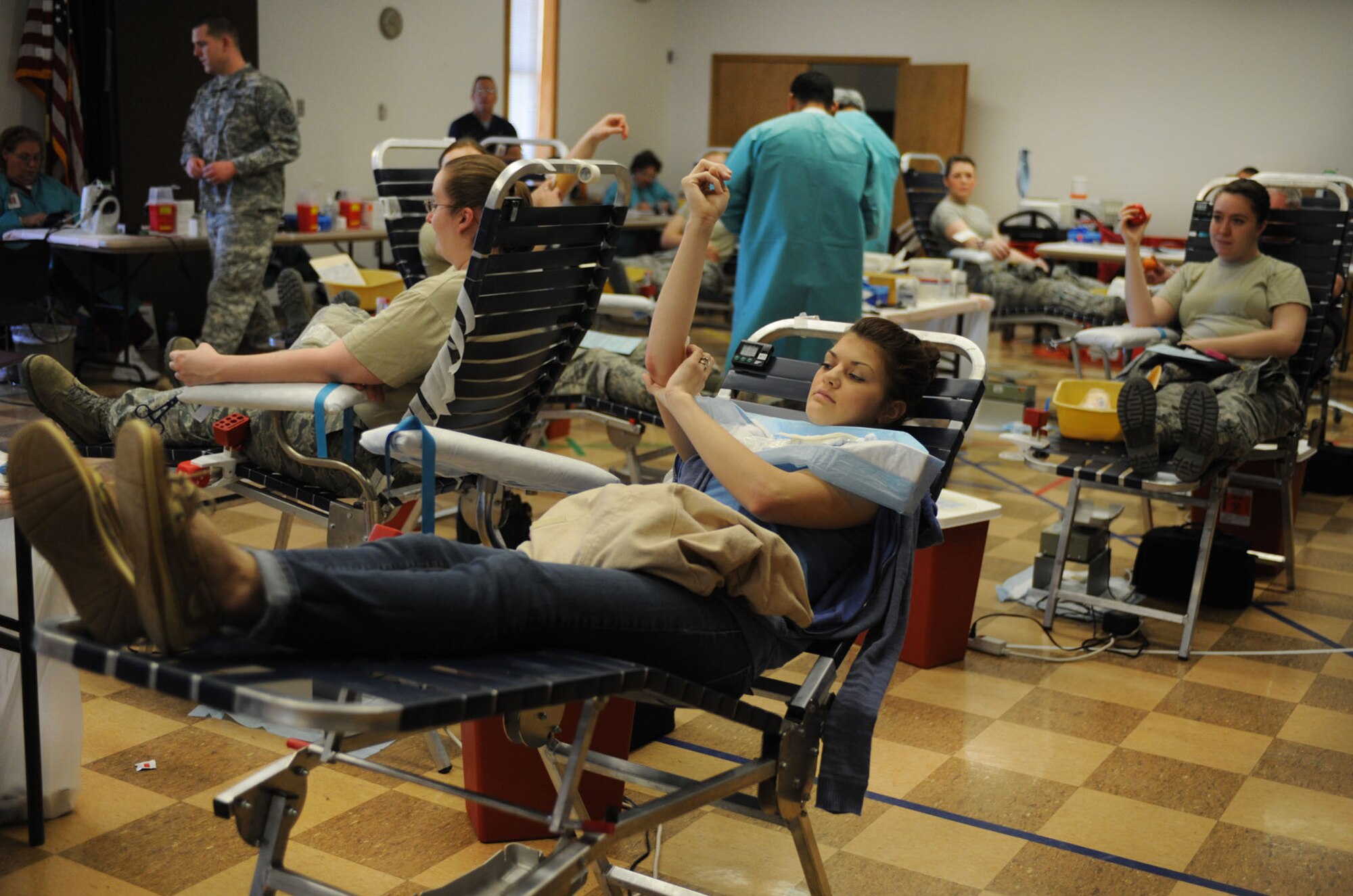 Volunteers donate blood at the Armed Services Blood Program blood drive at Cannon Air Force Base, N.M., March 5, 2013. The ASBP plans to return each quarter to Cannon to host future blood drives. (U.S. Air Force photo/Airman 1st Class Ericka Engblom)
