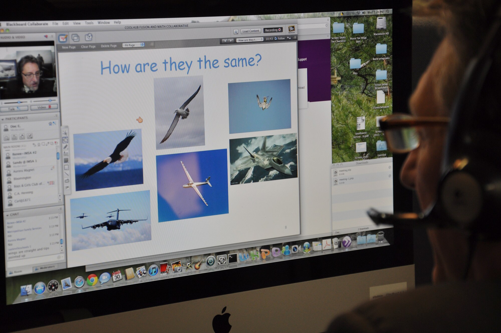 Dr. Don “Doc. E” Erbschloe, Air Mobility Command chief scientist, hosted a webinar teaching children how AMC learns about flying aircraft more efficiently from studying how birds fly. The webinar, in support of the Illinois Math and Science Academy FUSION program educated more than 500 students from 30 Illinois schools. (U.S. Air Force photo/Staff Sgt. Amber R. Kelly-Herard)