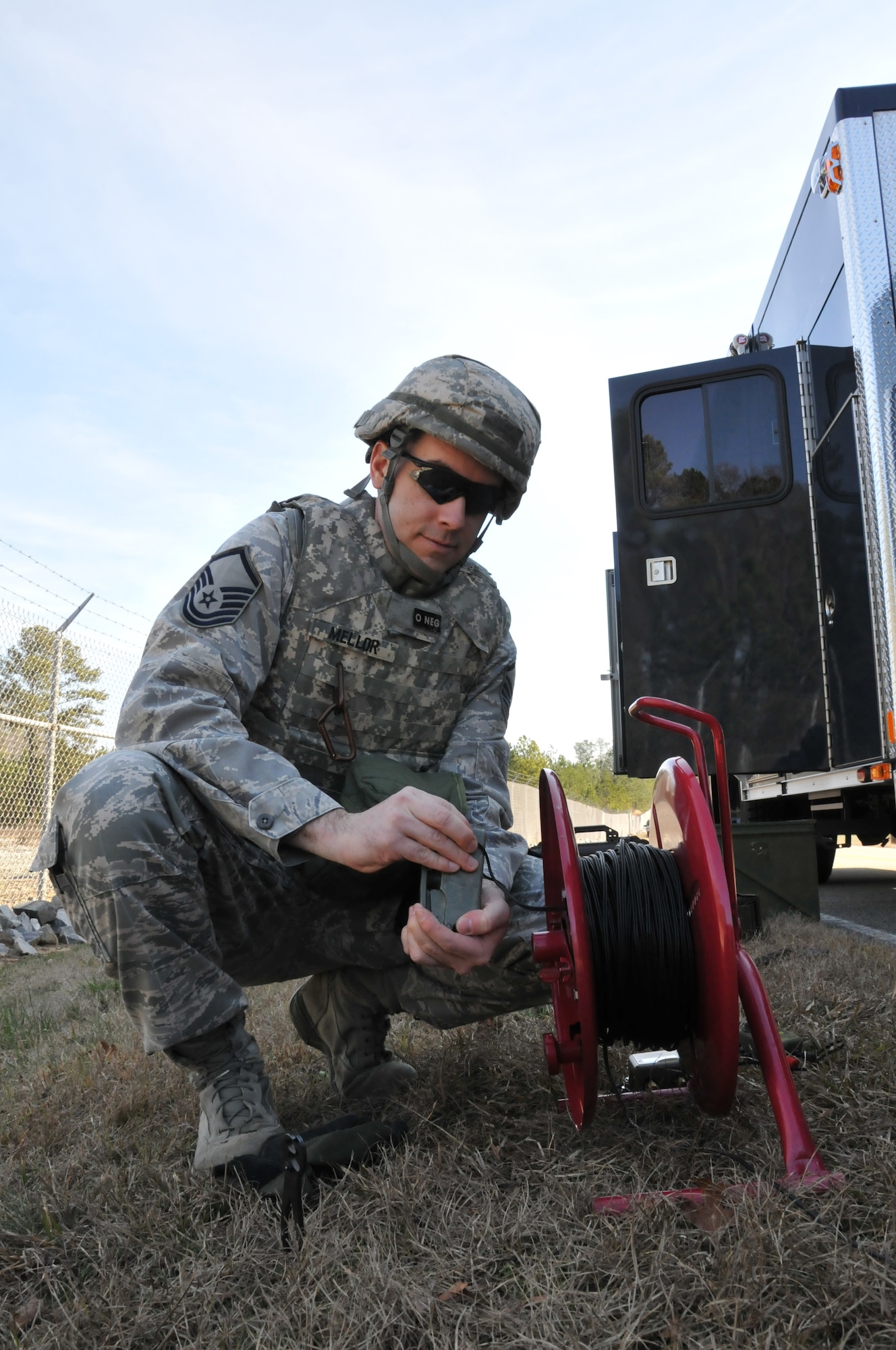 Master Sgt. Jason Mellor, 94th Explosive Ordnance Disposal craftsman, prepares to detonate as he participates in a training exercise simulating proper disposal of a pineapple grenade. The team is also regularly called out to off base locations within the Southeast to dispose of military explosive devices. Since EOD Airmen only get one chance to disarm ordnance they encounter, they rely a great deal on the training they receive. (U.S. Air Force photo/Senior Airman Elizabeth Van Patten)